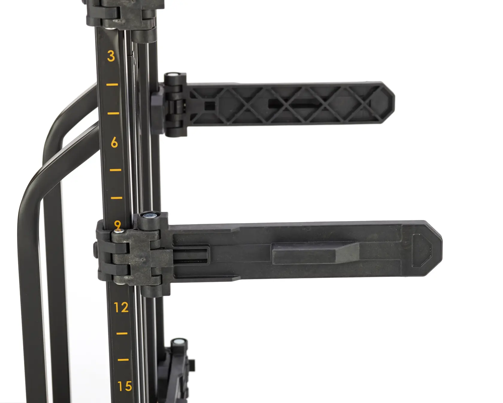 Close-up of a DEWALT adjustable support arm with measurement markings on a vertical metal frame, used for holding tools or materials.